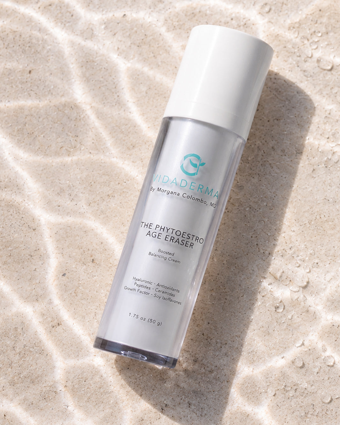 Skincare bottle labeled 'The Phytoestro Age Eraser' on a textured beige surface